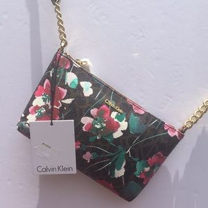 Calvin Klein crossbody. Floral Design over CK